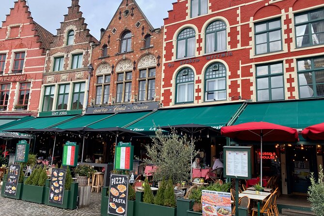 Bruges Highlights, Boat, Beer, Chocolate Day trip from Paris - The canal boat ride: the best way to see medieval Bruges from the water