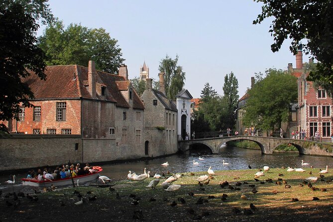 Bruges Highlights & Hidden Gems Small-group from Paris by Minivan - UNESCO Belfort, Market Square, and Center Highlights