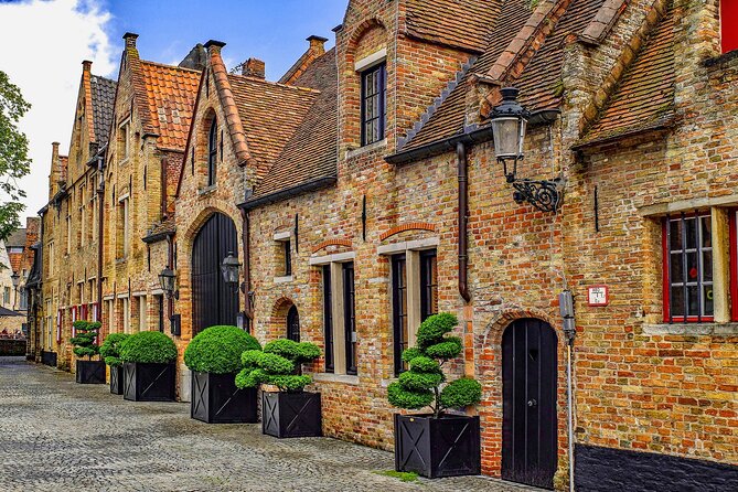 Bruges Highlights & Hidden Gems Small-group from Paris by Minivan - The Guide Factor: Passion Helps You See More