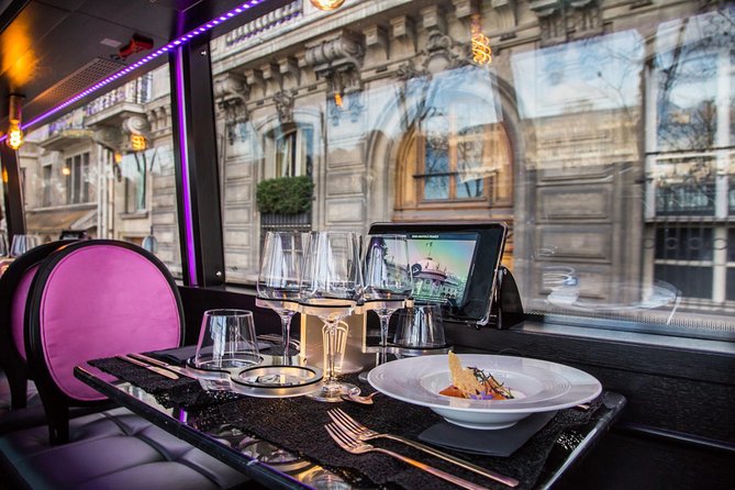 Champs-Elysées Lunch and Champagne on a Panoramic Bus - The big idea: sightseeing with dinner-table comfort