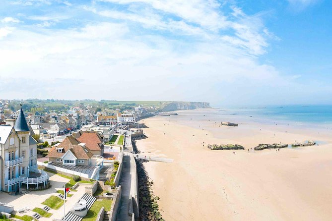 DDay Beaches Private Tour in Normandy from your Hotel in Paris - Pointe du Hoc: 90-foot cliffs, a real bunker, and bomb craters