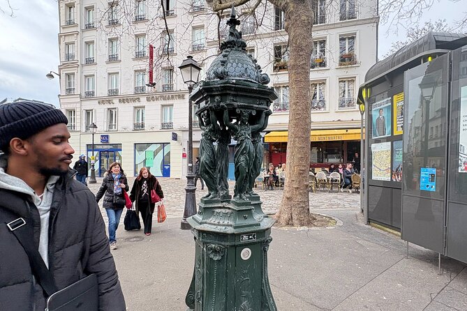 Explore Montmartre and Sacre Coeur with the best guides in Paris - Stop 3: Jardin des Abbesses as a Quiet Reset