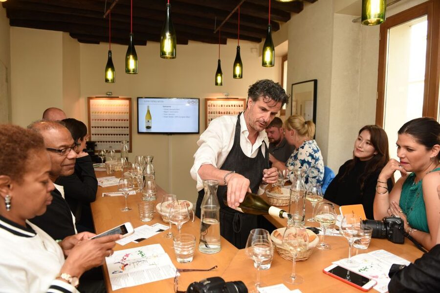 French Wine Tasting Class with a Sommelier - Entering the Latin Quarter wine shop (where the lesson starts)