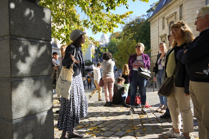Guided tour of Montmartre in songs with a professional - Place des Abbesses to the Wall of I Love You: words, languages, and singing