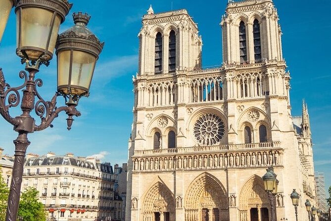 Half Day Paris Tour with Hotel pickup and drop - Louvre glass pyramid from the outside: see it, don’t wait all day