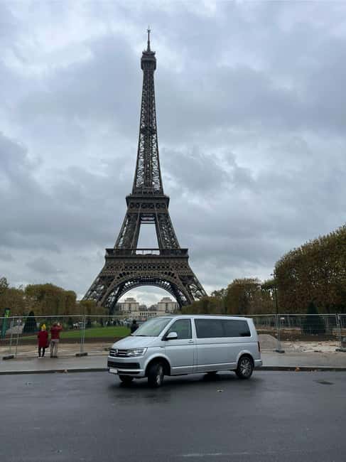 Hop On Paris: City Highlights Tour in a comfortable Minivan - Champs-Élysées cruise and Arc de Triomphe: grandeur with real-world context