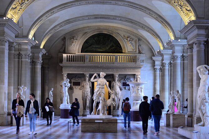 Louvre Late Opening Guided Tiny Group Tour - Meeting at Le Kiosque des noctambules and starting with a modern landmark