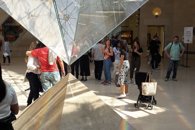 Louvre Museum Timed Entry Ticket with Audio Guide in 4 languages - Timed entry at the Louvre: what your ticket really buys you