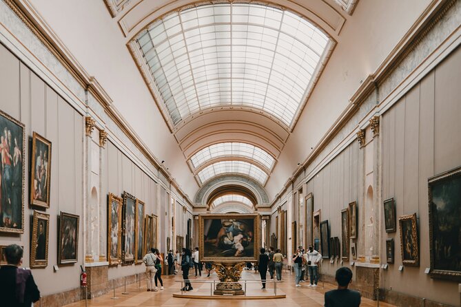 Mona Lisa and Treasures: Louvre Museum Experience 6-people Max - Guide styles that make the difference: Rowda, Monty, and Juan Carlos