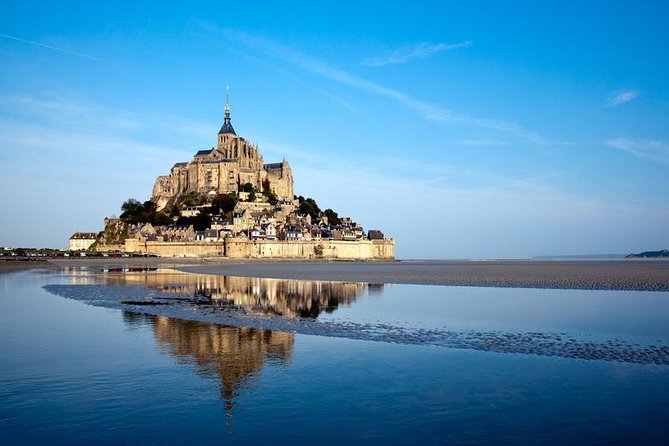 Mont Saint-Michel Day Trip from Paris with Abbey Ticket - Fortifications du Mont-Saint-Michel: Understanding the Tides and Threats