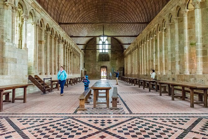 Mont Saint Michel Day Trip from Paris with English Speaking Guide - Coach logistics and the parking-to-town shuttle (and why it matters)
