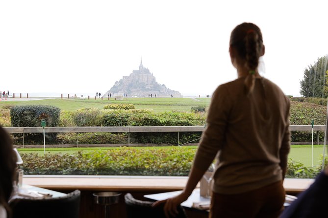 Mont Saint Michel Day Trip with Abbey Entrance from Paris - Fortifications, village lanes, and tide views: how to see the bay change