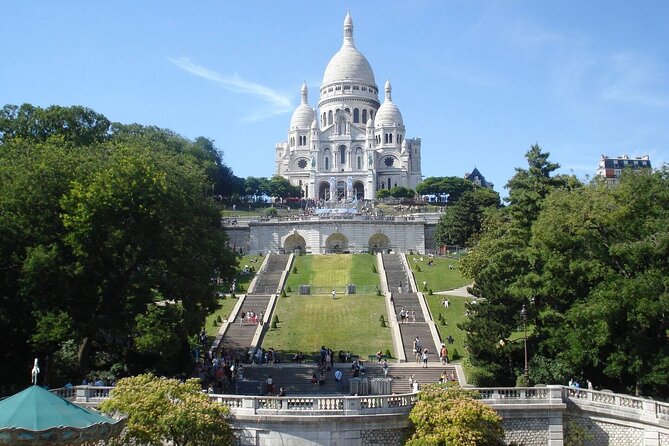 Montmartre and the Sacré-Coeur with the best guides in Paris - Moulin Rouge Stop: A Belle Époque Hit Before the Climb