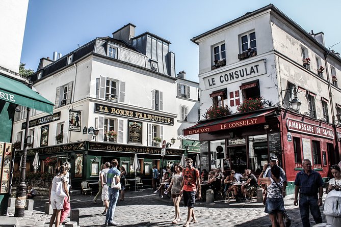 Montmartre District and Sacre Coeur - Exclusive Guided Walking Tour - Rue Lepic and van Gogh’s house: seeing the art route in real streets