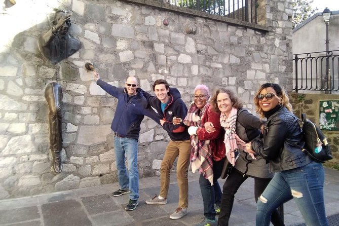 Montmartre Hidden Gems and Scenic Highlights Walking Tour - An old Montmartre street: cafés, boutiques, and bohemian architecture