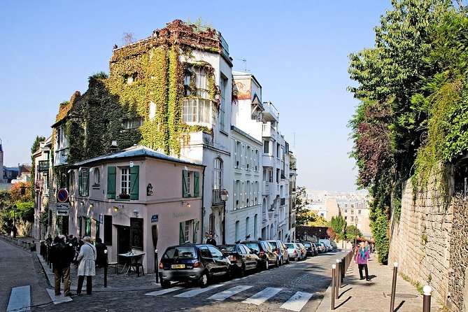 Montmartre Hidden Gems and Scenic Highlights Walking Tour - Moulin de la Galette: the hilltop windmill icon (from outside)