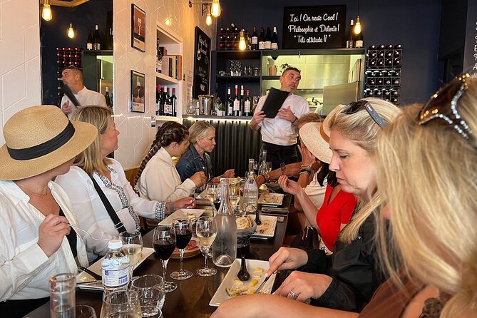 Montmartre Hill French Gourmet Food and Wine Tasting Walking Tour - Stop-by-stop flavor story: from Clos des Vignes to sweet finishes