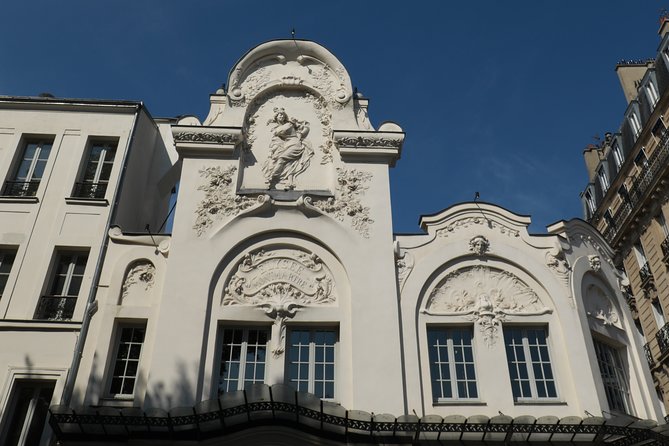 Montmartre Private Walking Tour - Stop 3: Le Passe-Muraille—tiny statue, big attitude