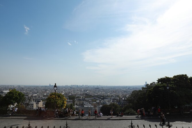 Montmartre Private Walking Tour - Stop 5: Basilique du Sacré-Cœur—views plus a turning-of-the-century vibe