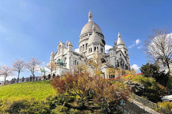 Montmartre & Sacré Coeur : Museum & Coffee In A Tiny Group Tour - Rue Lepic and Artist Streets: Modigliani, Toulouse-Lautrec, and Picasso