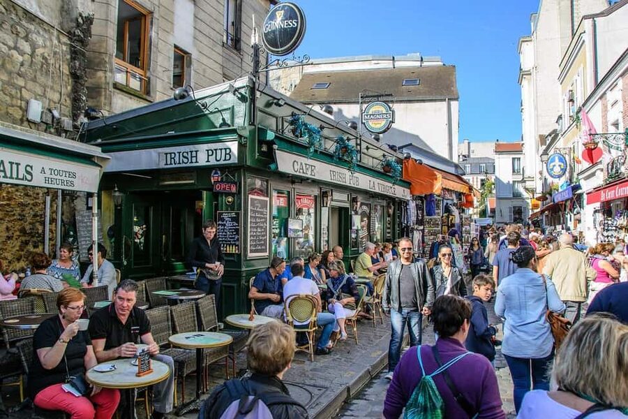 Montmartre Walking Tour with a Local Guide - Walking up to Sacré-Cœur: big views, moderate climbs, smart pacing