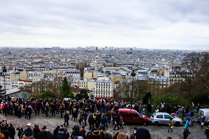 Montmartre Walking Tour with a Private Local Guide - Moulin Rouge side, Montmartre vineyards, and windmill stories