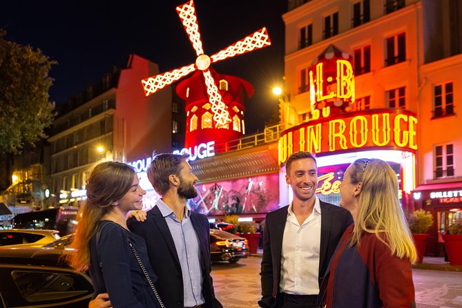 Moulin Rouge Dinner Show with Champagne and Drop Off - The Show: Feerie With Doriss Girls, Moving Stairs, and a Giant Aquarium