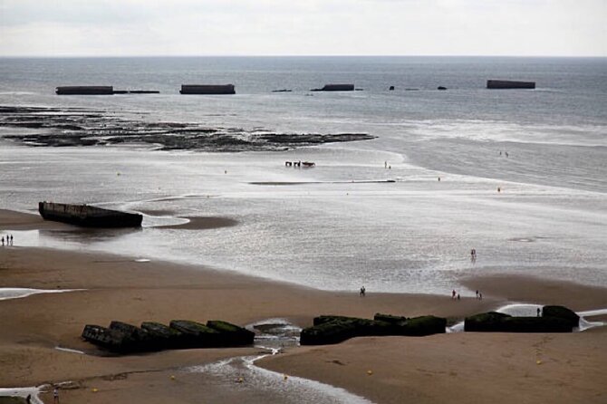 Normandy D-Day Beaches: Immersive Small Group Tour from Paris - Pointe du Hoc: 100-foot cliffs and the Ranger climb