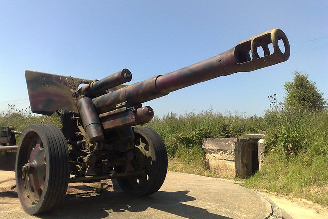 Normandy D-Day Landing Beaches Guided Tour from Paris by minivan - Pointe du Hoc: bunkers, craters, and dramatic Channel views