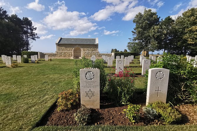 Normandy Landing Beaches Private Day Tour from Paris - Arromanches-les-Bains: Seeing the Harbor Remains