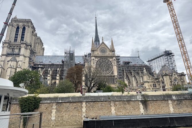 Notre-Dame Cathedral Access and Outdoor Walking Tour - Gothic architecture you can spot fast: portals, Rose Windows, buttresses, gargoyles