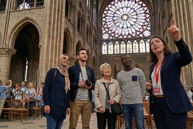 Notre Dame Cathedral:Interior & Exterior Small Group Guided Tour - Inside the restored cathedral: nave height, stained glass, and chapels