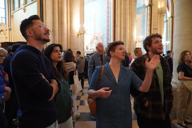 Notre Dame Cathedral Small-Group Interior & Exterior Guided Tour - Inside the restored cathedral: stained glass, vaults, and fire recovery context