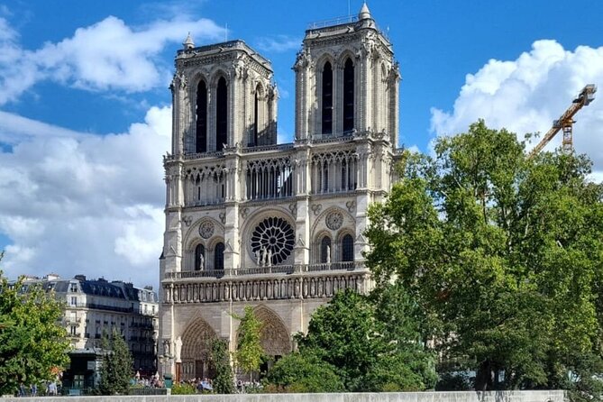 Notre Dame Interior Small Group Guided Tour Max 5 Participants - Meeting at the Statue de Charlemagne: simple, central, and easy to find