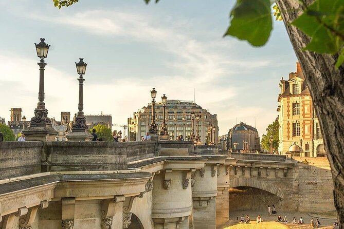 Notre Dame Outdoor and City Center of Paris with Local Guide - Palais de Justice and the Seine: law, stone, and a breather by the water