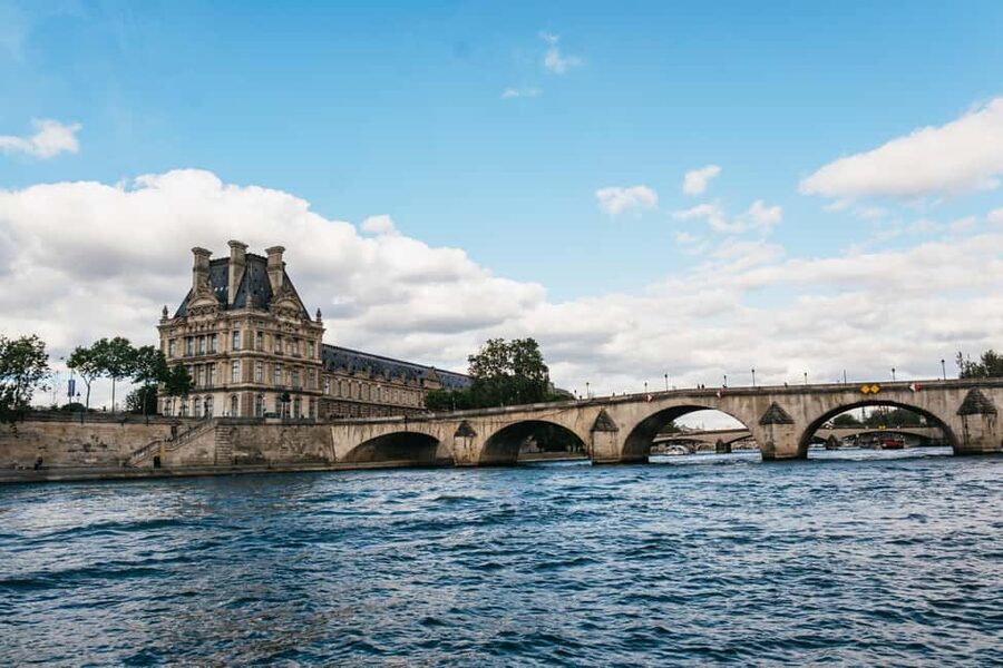 Paris : 3-Course Gourmet Dinner Cruise on Seine River - The onboard vibe: service, live music, and comfort on a glass boat