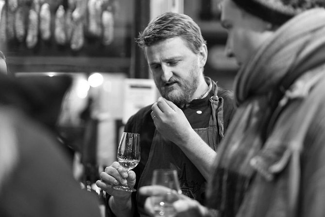 Paris Art of Pairing Cheese and Wine Tasting in a Cheese Cellar - The Cellar Descent: Cold Air, Big Wheels, and Real Aging