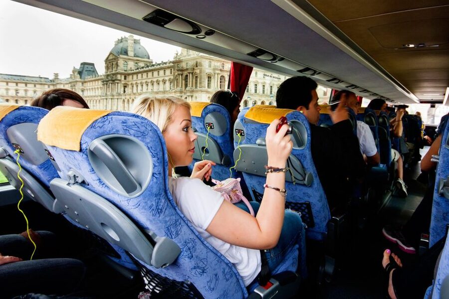 Paris: Audio-Guided Bus Tour & Seine River Cruise - Boarding the Seine: what the glass-fitted trimaran experience feels like