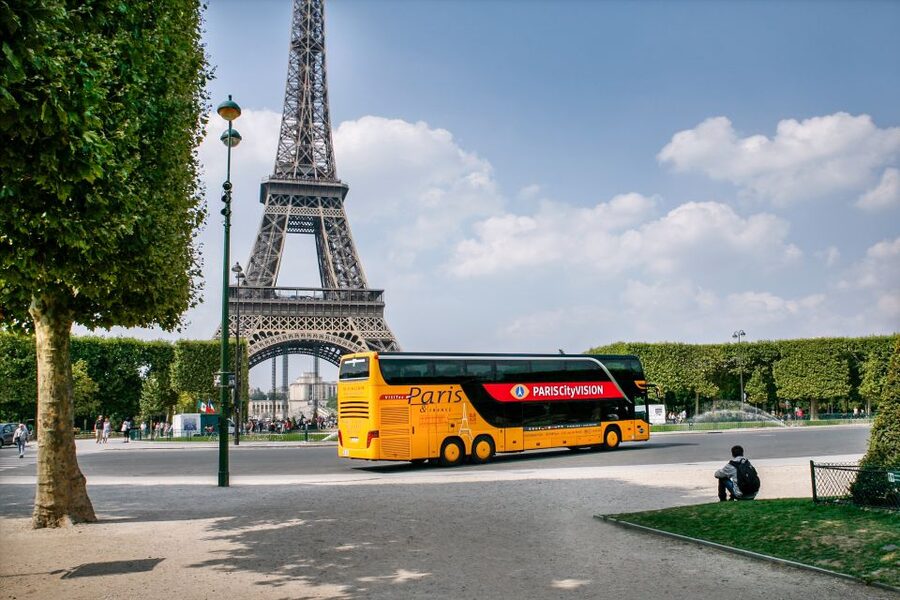 Paris: Audio-Guided Bus Tour & Seine River Cruise - Tablet audio on the bus: 3D reconstructions and before/after views