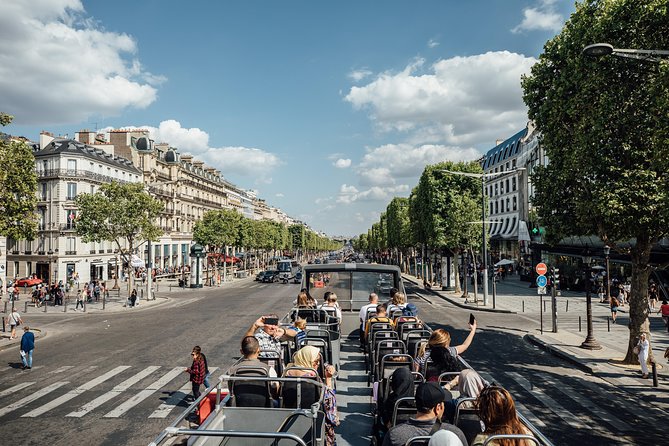 Paris Big Bus Hop-On Hop-Off Tour with Optional River Cruise - Audio Commentary: Free Headphones and 9-Language Navigation Help