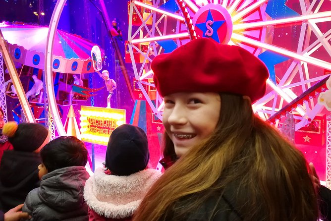 Paris Christmas Illuminations and Local Festivities Private Tour - Tuileries Garden: the Ferris wheel and holiday market moment