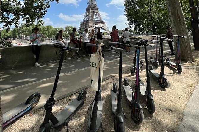 Paris City Tour by E-Scooter with Fun Guide (Small groups) - Champs-Élysées to Arc de Triomphe: grand streets, planned stops