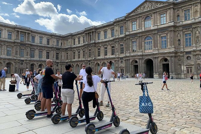 Paris City Tour by E-Scooter with Fun Guide (Small groups) - Eiffel Tower viewpoint plus the Tuileries and Liberty memorial moments