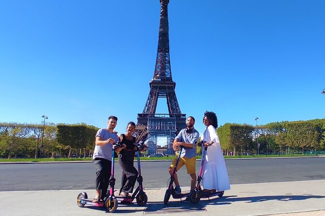Paris City Tour by E-Scooter with Fun Guide (Small groups) - Grand Palais to Invalides: architecture breaks from the big boulevard loop