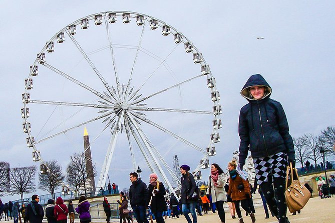Paris City Tour with Private Friendly Guide and all Must-See Sites - Champs-Élysées to Concorde to Arc de Triomphe: stories at street level
