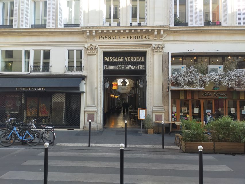 Paris: Covered Passages Walking Tour - Passage Choiseul: the sunlit shops and the tiled-floor moment