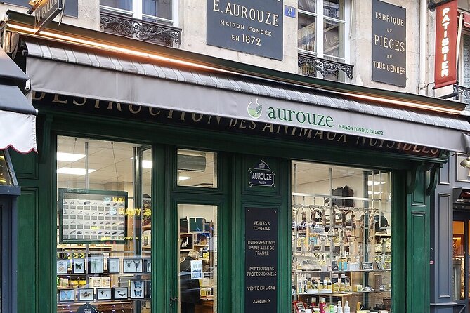 Paris Darkest Tales A Night of Secrets and Legendary Bar Tour - The Louvre stop: one painting, one rumor, and the price of entry