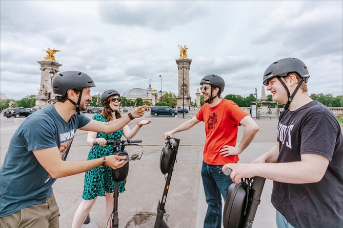 Paris E-Scooter Tour with fun & informative guide (small groups) - Louvre area: the glass pyramid and the palace views