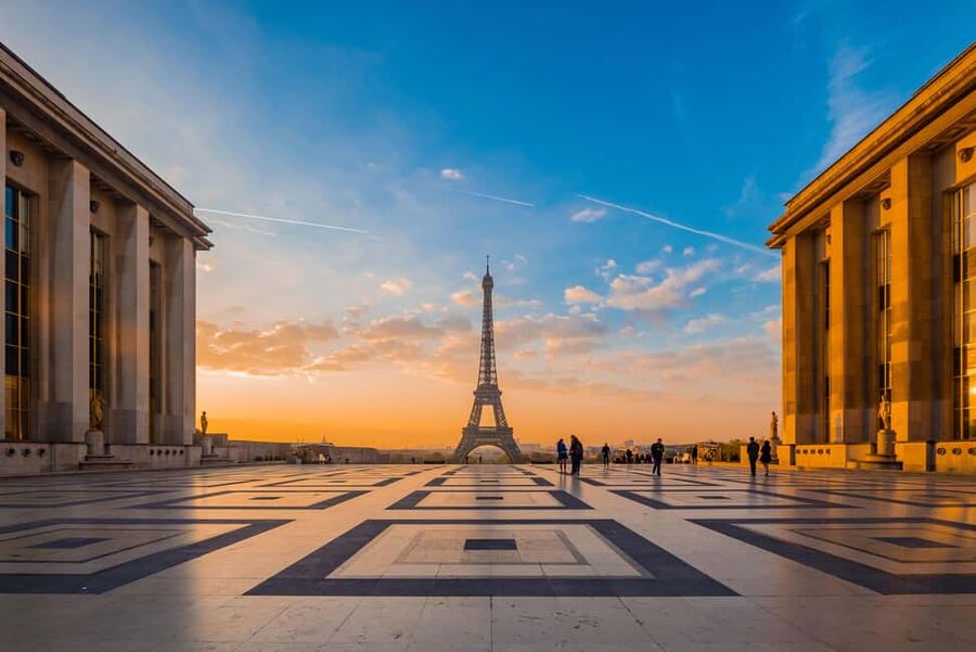 Paris: Eiffel Tower Guided Tour|Summit & second floor access - At the base: Eiffel’s vision, the 1889 World’s Fair, and why this tower exists