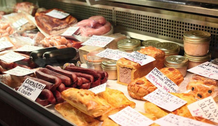 Paris: Food Market Tour in Bastille - Aligre Market up close: covered stalls and the outdoor food-flea mix